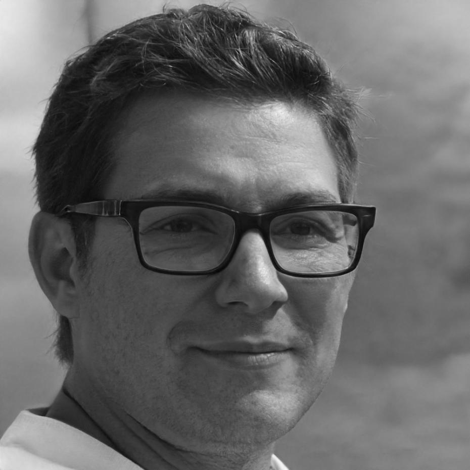 Professional headshot of senior financial analyst